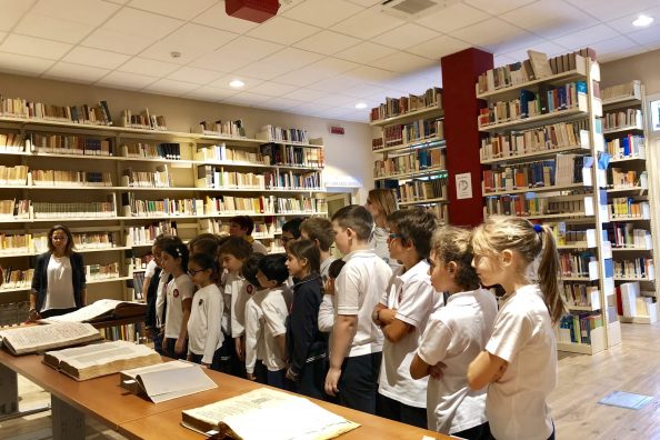 Students from Gonzaga Institute in Palermo in the school library